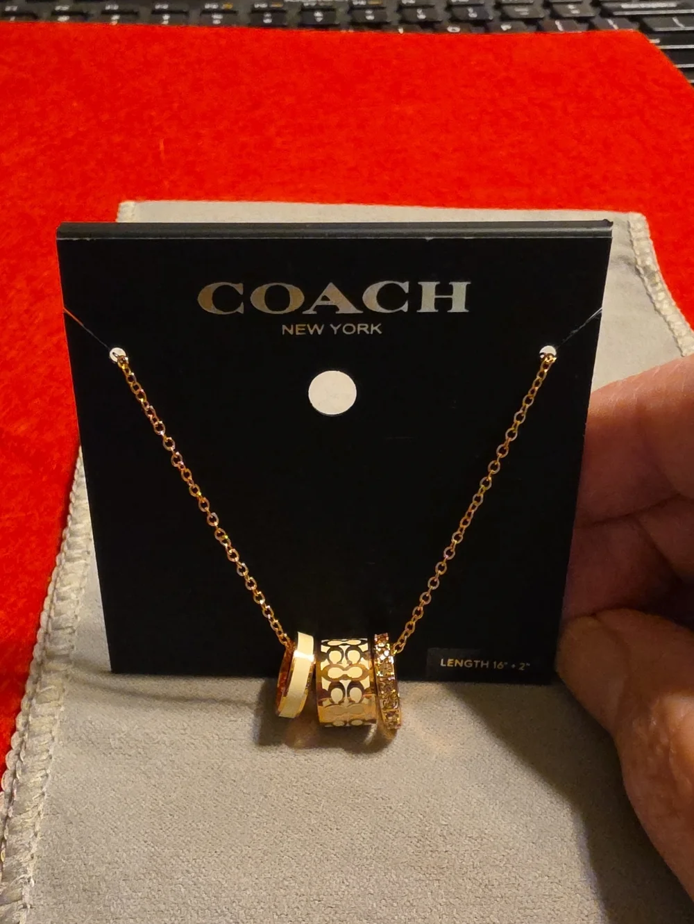 Coach Rose Gold-Tone Three-Ring Pendant Necklace